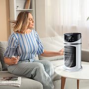 Woman relaxing indoors with a sleek eprolo bladeless AC fan, showcasing the silent operation and stylish design.