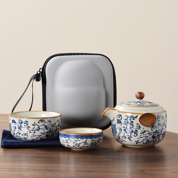Portable Blue And White Beige Ru Kiln Travel Tea Set by eprolo, featuring a beautifully designed teapot and two cups, with a protective case and a vintage floral pattern.