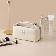 Portable premium canvas makeup bag in cream color, featuring a stylish design by eprolo, perfect for storing cosmetics and toiletries.