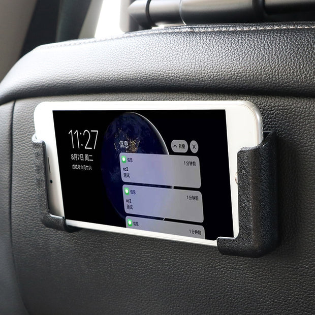 Close-up of the LEEPEE Adjustable Width Car Interior Accessories Multifunction Car Cell Phone Holder, displaying a smartphone securely mounted on a car dashboard, showcasing its self-adhesive feature. From vendor eprolo.