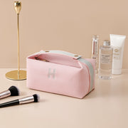 Trendy portable premium canvas makeup bag in pink, ideal for women on-the-go, by eprolo, offering spacious storage for beauty essentials.