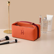 Chic portable premium canvas makeup bag in orange with a modern look, crafted by eprolo for stylish cosmetic organization.