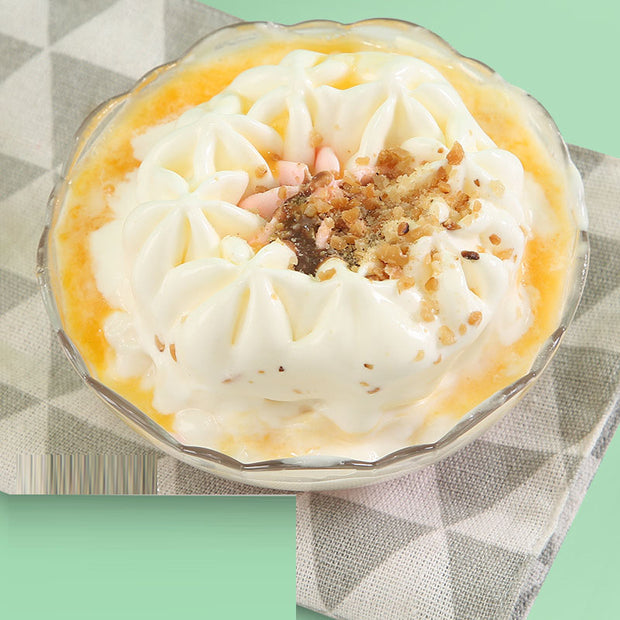 Preparing ingredients for the electronic ice cream machine, your go-to electric ice cream maker for refreshing summer desserts.