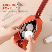 Orange portable canvas makeup bag from eprolo with a large opening for easy access, perfect for organizing daily makeup essentials.