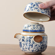 Portable Blue And White Beige Ru Kiln Travel Tea Set by eprolo, illustrating the ease of stacking the teapot and cups, featuring intricate blue floral designs.